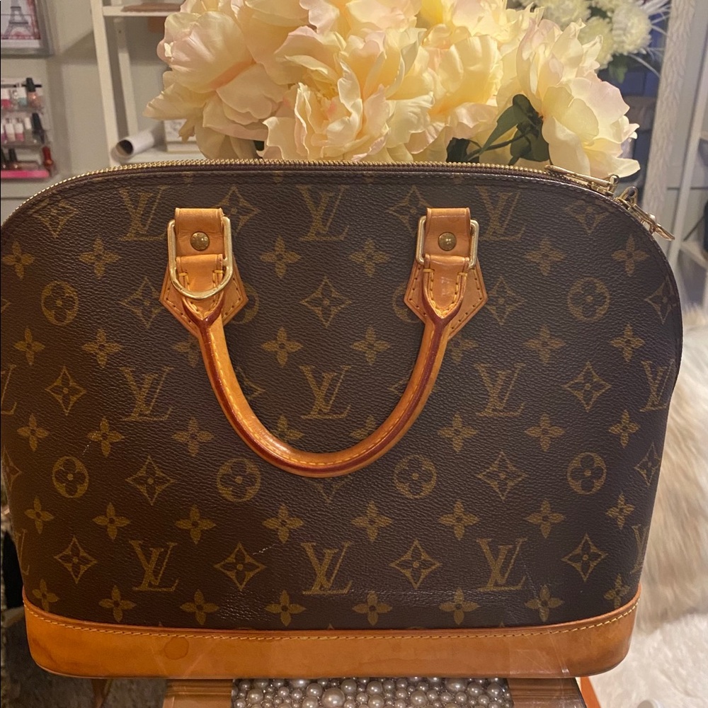 Louis Vuitton Alma Monogram Satchel